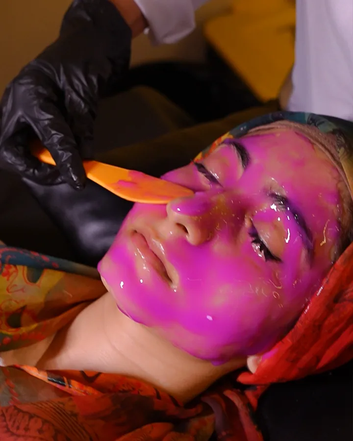 Jelly mask gel being spread over the face at Luxeria Clinic